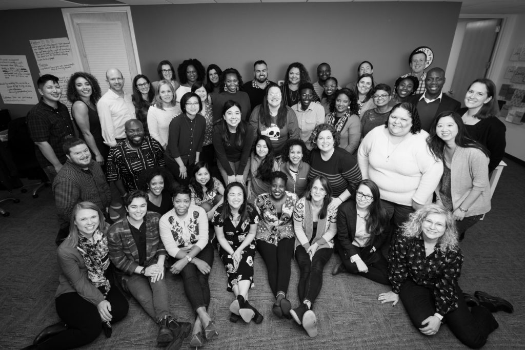 The Management Center staff in 2019. About 40 people smiling at the camera.